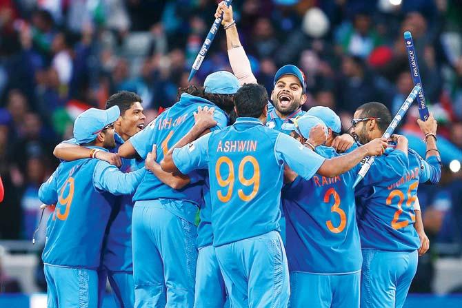 The Indian team, led by Mahendra SinghâÂu00c2u0080Âu00c2u0088Dhoni celebrate their ICC Champions Trophy win after beating hosts England in the final at Edgbaston, Birmingham on June 23, 2013. Pic /Getty Images