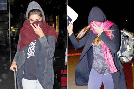 Nargis Fakhri covers up after being spotted with Uday Chopra