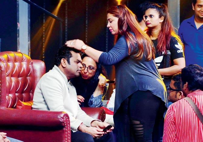 AR Rahman gets his hair fixed on the sets of a singing reality show in Malad yesterday. Pic/Milind Saurkar