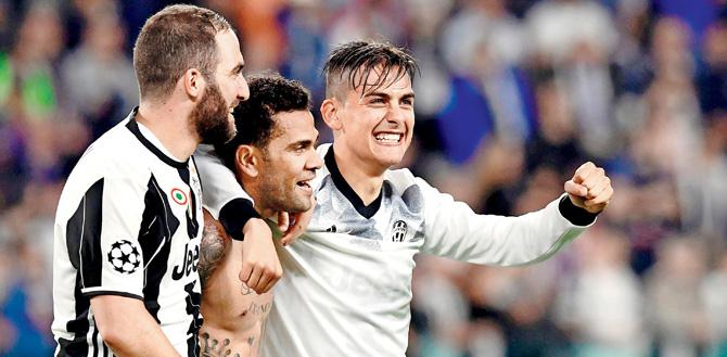 Juventus players celebrate a goal against Monaco on Tuesday. Pics/Getty Images