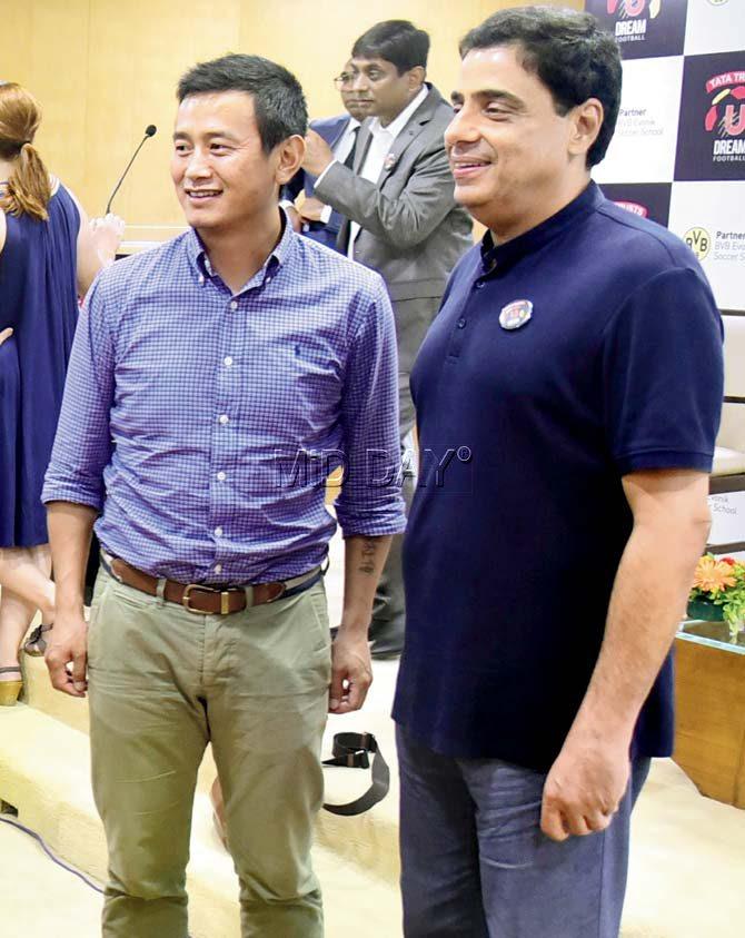 Former India player Bhaichung Bhutia (left) with U Sports