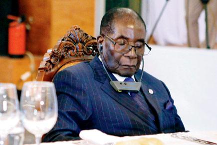 'Zimbabwean President Robert Mugabe not asleep, just resting his eyes'