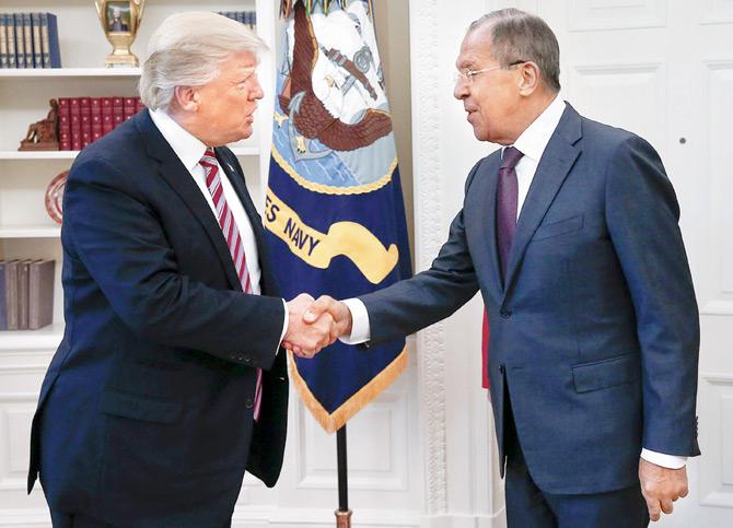 President Donald Trump shaking hands with Russian Foreign Minister Sergei Lavrov  during their meeting at the White House. Pics/AFP