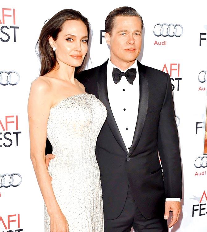 Angelina Jolie with ex-husband Brad Pitt. Pic/Getty Images
