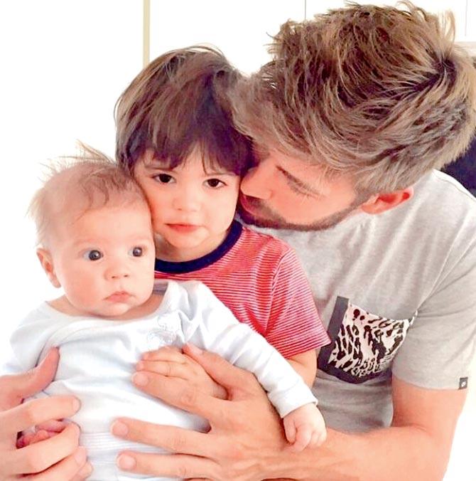 Gerard Pique with sons Milan and Sasha
