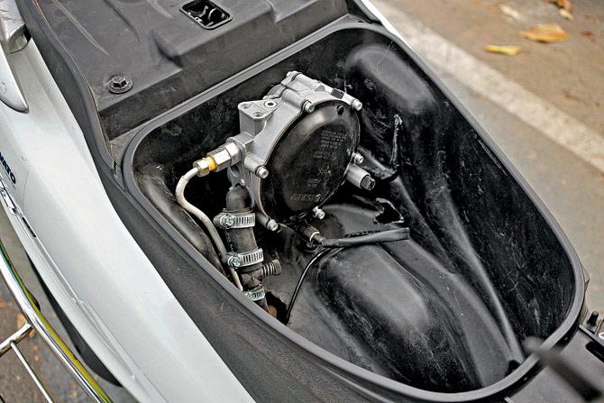CNG regulator occupies a chunk of the under-seat storage space