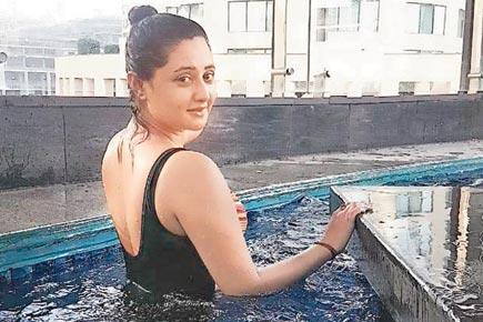 Rashami Desai beats the heat by diving into the pool