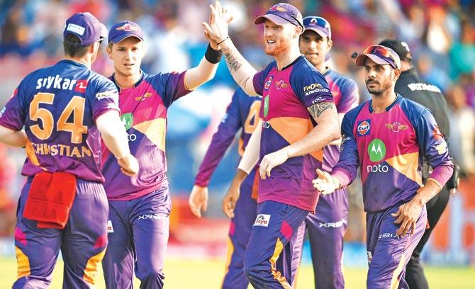 Rising Pune Supergiant al-rounder Ben Stokes celebrates a Kings XI Punjab wicket with teammates during their IPL-10 match at the Maharashtra Cricket Association Stadium in Pune yesterday. Pic/AFP