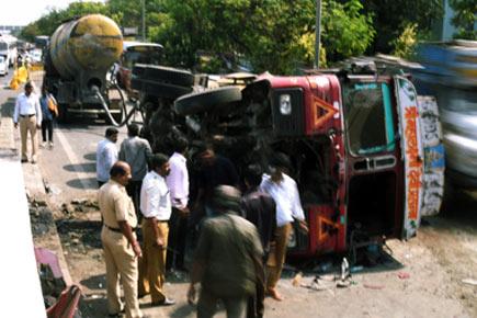 Traffic snarls at Kherwadi signal after cement container turns turtle