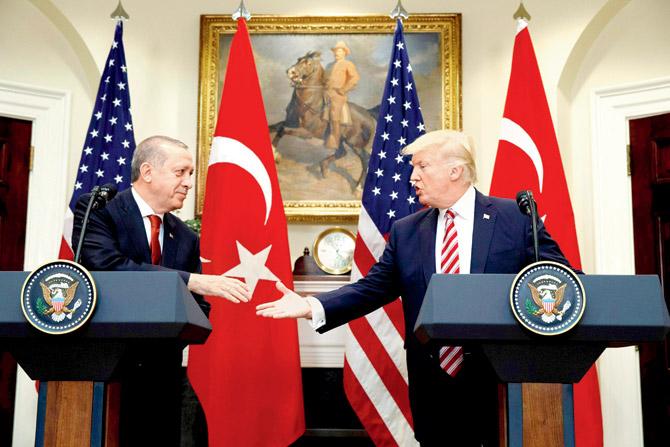 President Donald Trump shakes hands with Turkish President Recep Tayyip Erdogan at the White House on Tuesday. Pic/AP