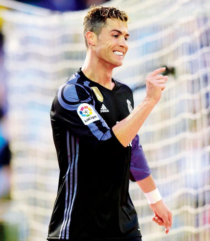 Real Madrid forward Cristiano Ronaldo celebrates his goal against  Celta Vigo during a Spanish League match on Wednesday. Pic/AFP