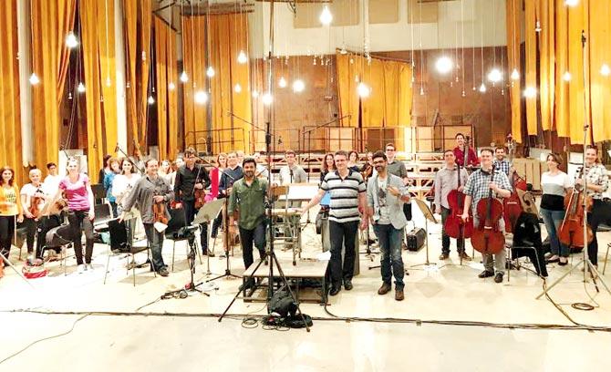 Sachin (in green) and Jigar (in grey) with the Hungarian Studio Orchestra
