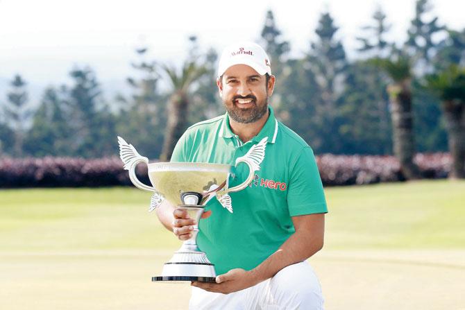 Indian golfer Shiv Kapur with the Asian Tour trophy yesterday