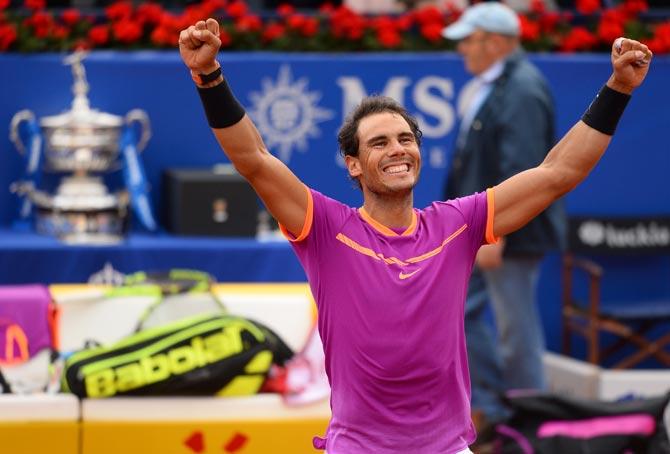 Spanish tennis player Rafael Nadal celebrates his victory over Austrian tennis player Dominic Thiem at the end of the ATP Barcelona Open. Pics/AFP