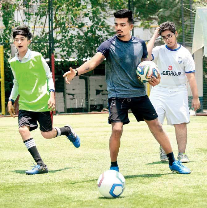 Pratik Shinde, 21, who became the youngest player ever to bag a foreign contract six years ago, and then played for the Indian Soccer League for Pune City at 19, has started the Pratik Shinde Football Academy on the premises of the NG Acharya & DK Marathe College. Pic/Suresh Karkera
