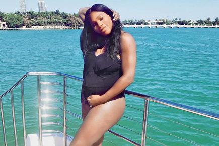 Bikini mommy! Serena Williams posts pictures of baby bump in bikini