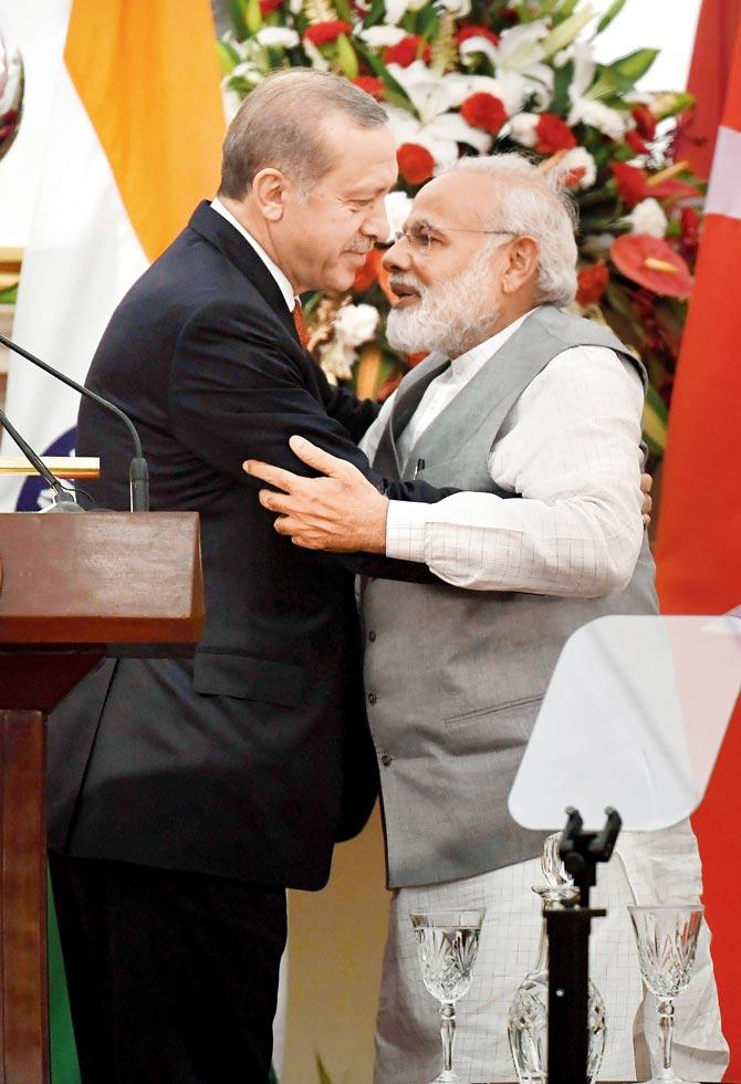 Prime Minister Narendra Modi and Turkish President Recep Tayyip Erdogan greet each other after an exchange of agreements in New Delhi yesterday. Pic/AFP