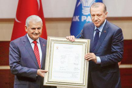 Turkish President Recep Tayyip Erdogan rejoins ruling party in power move