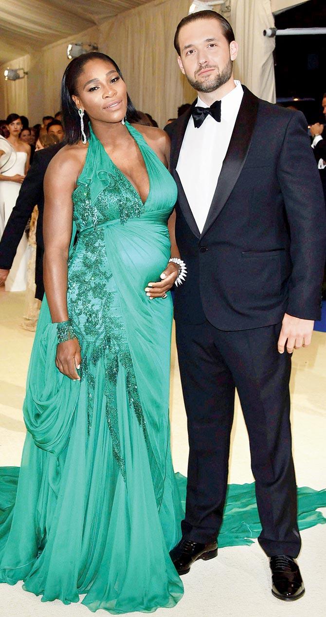 American tennis star Serena Williams, who opted for a Versace gown, shows off her baby bump with fiancé, Reddit co-founder Alexis Ohanian. Pic/AP, PTI