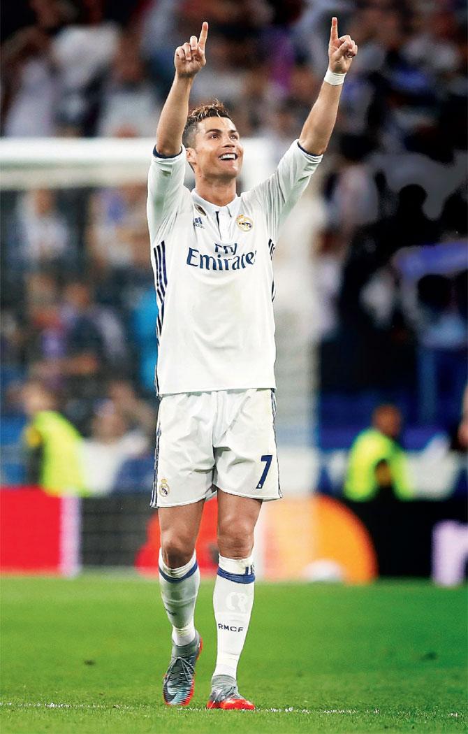 Cristiano Ronaldo celebrates Real Madrid’s 3-0 win vs Atletico Madrid after the Champions League semis clash on Tuesday. Pic/Getty Images