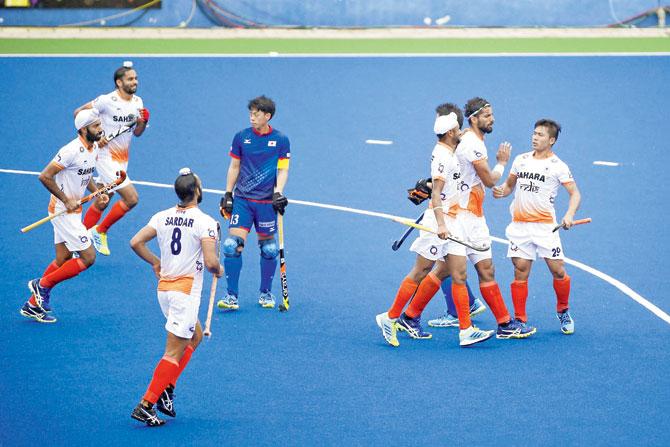 Indian players celebrate a goal against Japan yesterday. Pic/PTI