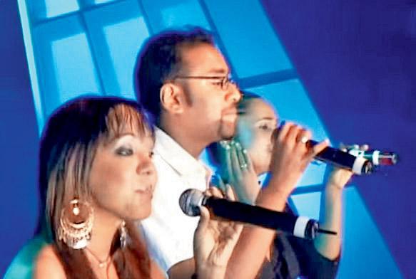 A younger Dayal (centre) with S5 at a concert in 2006
