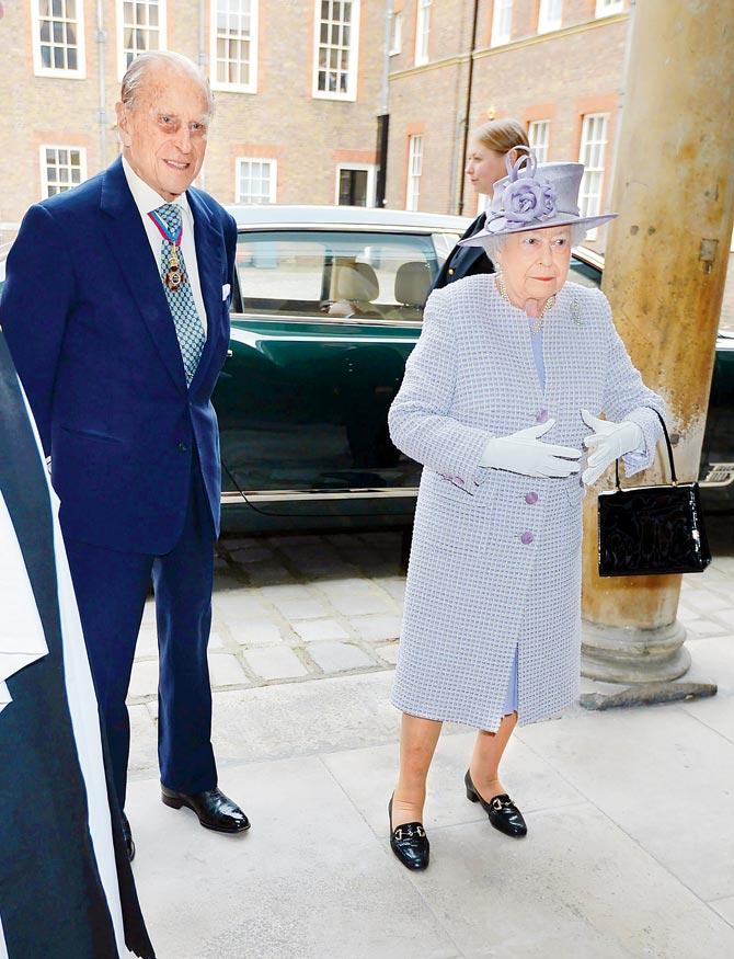 Prince Philip and Queen Elizabeth II arrive at Chapel Royal in London, for an Order of Merit service on Thursday. Pic/AFP
