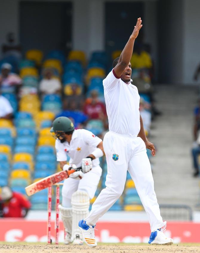 Shannon Gabriel (R) of West Indies celebrates the dismissal of Misbah ul Haq (L) of Pakistan during the 5th and final day of the 2nd Test match between West Indies and Pakistan. Pic/AFP