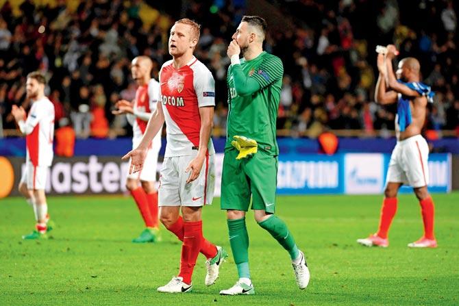 Monaco players wear a dejected look after the final whistle