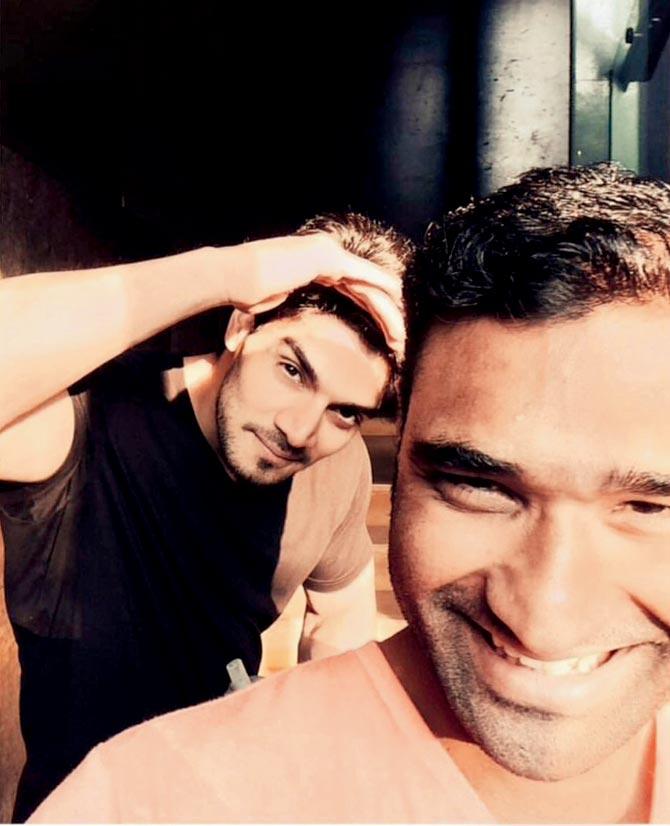 Sooraj Pancholi with his trainer, Rajeev Singh, with whom he has co-written a book on fitness