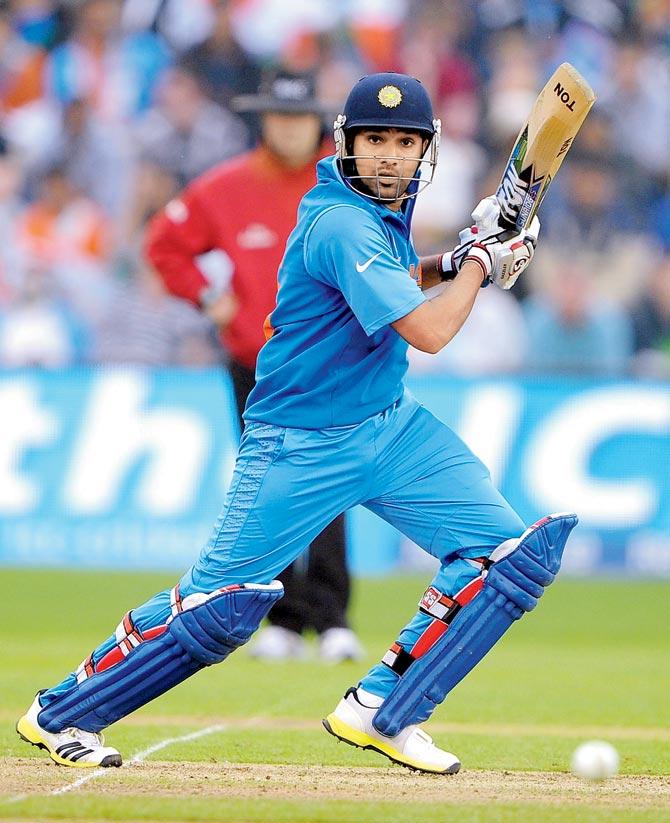 Rohit Sharma plays a shot during the 2013 ICC Champions Trophy semi-final match vs Sri Lanka in Cardiff. Pic/Getty Images