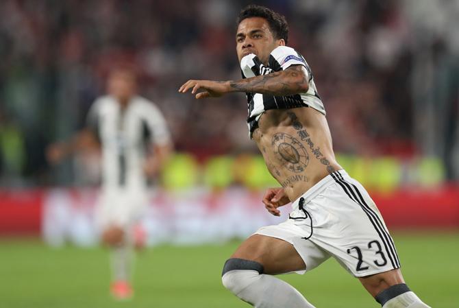 Juventus Defender from Brazil Dani Alves celebrates after scoring during the UEFA Champions League semi final second leg football match Juventus vs Monaco, on May 9, 2017 at the Juventus stadium in Turin. Pic/AFP