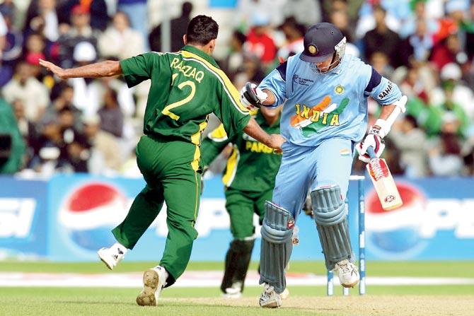 Pakistan’s Abdul Razzaq (left) collides with India’s Rahul Dravid while going for the ball during the ICC Champions Trophy match in 2004 at Edgbaston in Birmingham. Pic/Getty Images