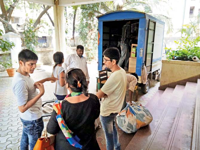 Chandni Chheda (grey T-shirt) and Chetan Parmar (extreme right) were called to the Charkop police station on Sunday to collect their belongings