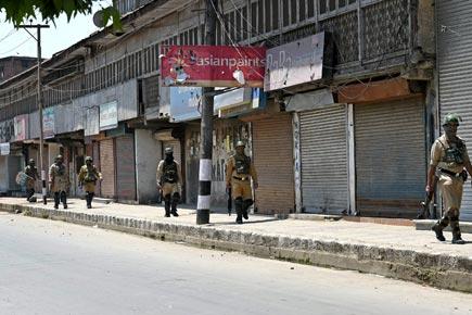 Curfew, restrictions continue in Kashmir