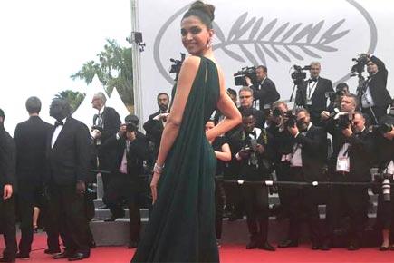 Cannes 2017: Deepika Padukone styles up with smoky eyes, thigh-high slit