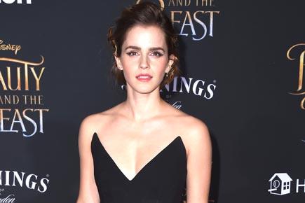 Emma Watson risked wardrobe malfunction in low white gown