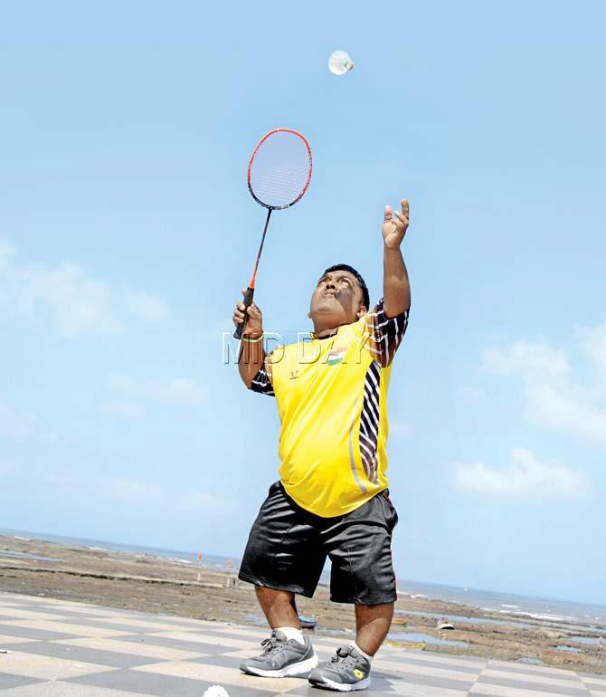 The para-badminton player aims for a shot at Bandra’s Carter Road. Pic/Sneha Kharabe