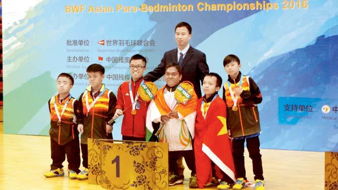 Mark Dharmai (third from right) at the Asian Para-Badminton Championship 2016 in Beijing