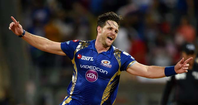 Mumbai Indians bowler Mitchell Mcclenaghan celebrates the wicket of Rising Pune Supergiants batsman Rahul Tripathy during the first play off match of IPL. Pic/AFP
