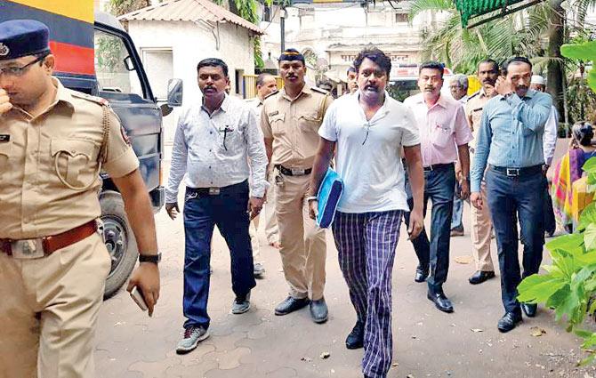 NCP MLA Ramesh Kadam after his arrest by the Nagpada police
