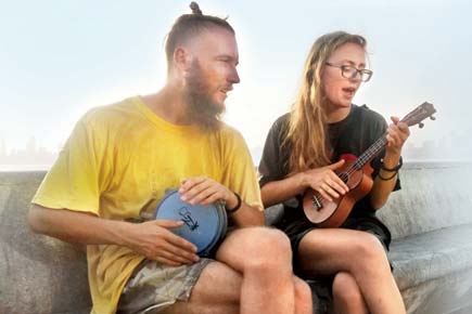 Young Belarusian couple singing to fund world tour land in Mumbai