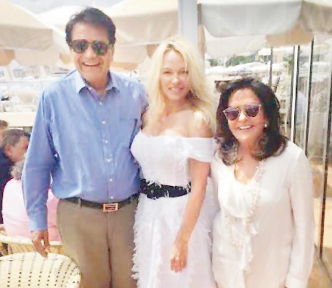 Satish and Abha Modi with Pamela Anderson