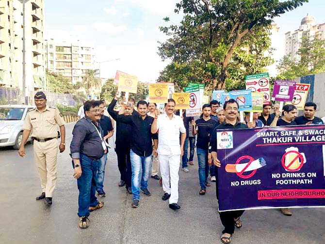 Residents were joined by MLA Prakash Surve during their peace march in Kandivli East, yesterday