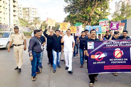 Shiv Sena politicians protest against their bosses with a peace march in Mumbai