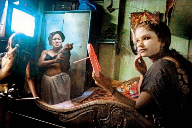 "In the Shadows of Kolkata" by Souvid Datta uses a doctored image of a Mumbai brothel originally shot by Mary Ellen Mark in the 1970s