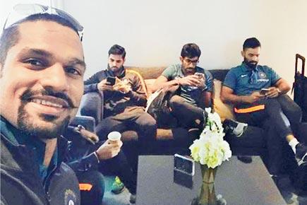 Dhawan's selfie when Karthik, Bhuvneshwar and Bumrah get phone busy