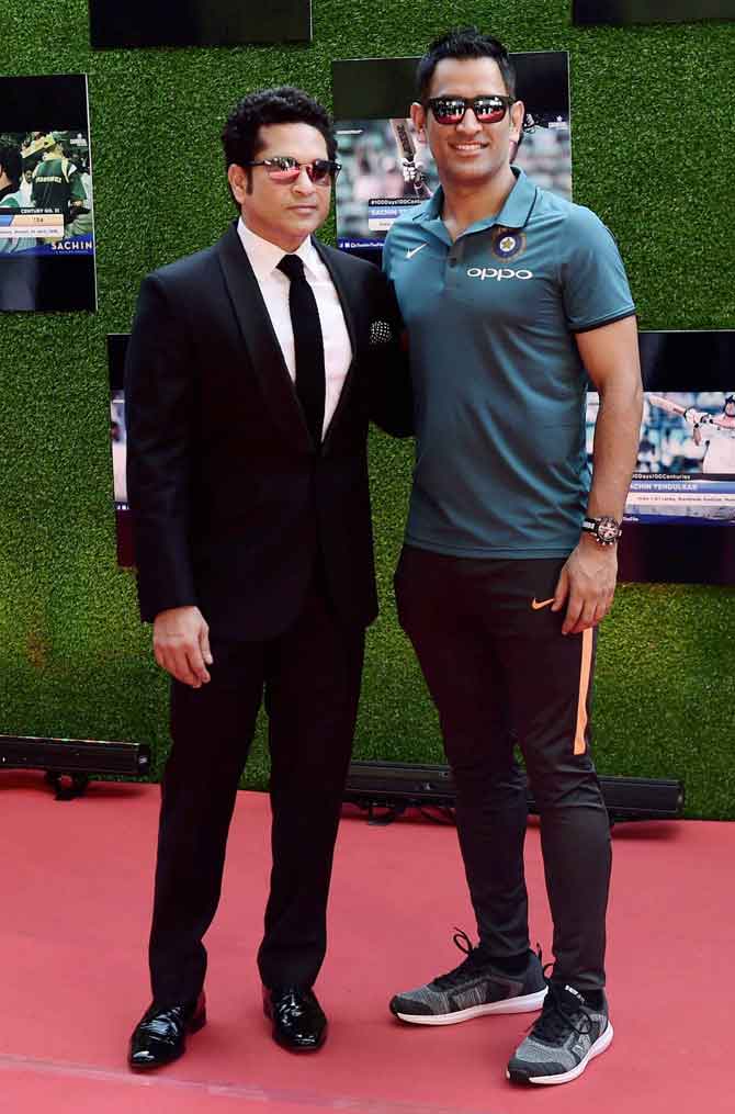 Master blaster Sachin Tendulkar along with MS Dhoni during before the screening of his biopic 
