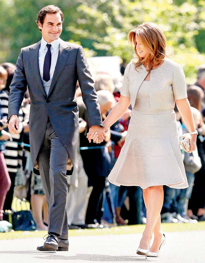 Swiss tennis ace Roger Federer with wife Mirka arrive at St Mark’s Church to attend the wedding of Pippa Middleton and James Matthews in Englefield, England on May 20. Pic/AFP