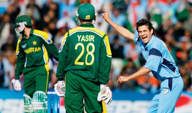 India’s Ifran Pathan (right) celebrates after dismissing a Pakistan batsman during the Champions Trophy match in 2004. Pic/Getty Images 